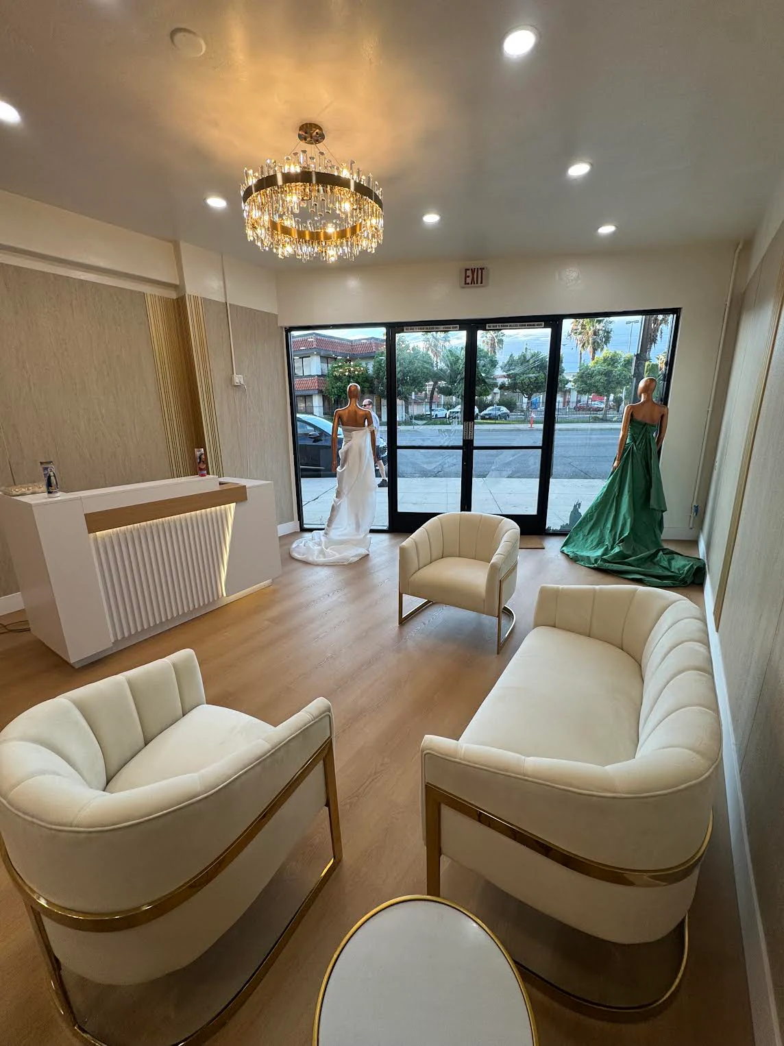 Cream and gold seating area inside the SOMAR COUTURE atelier in Burbank